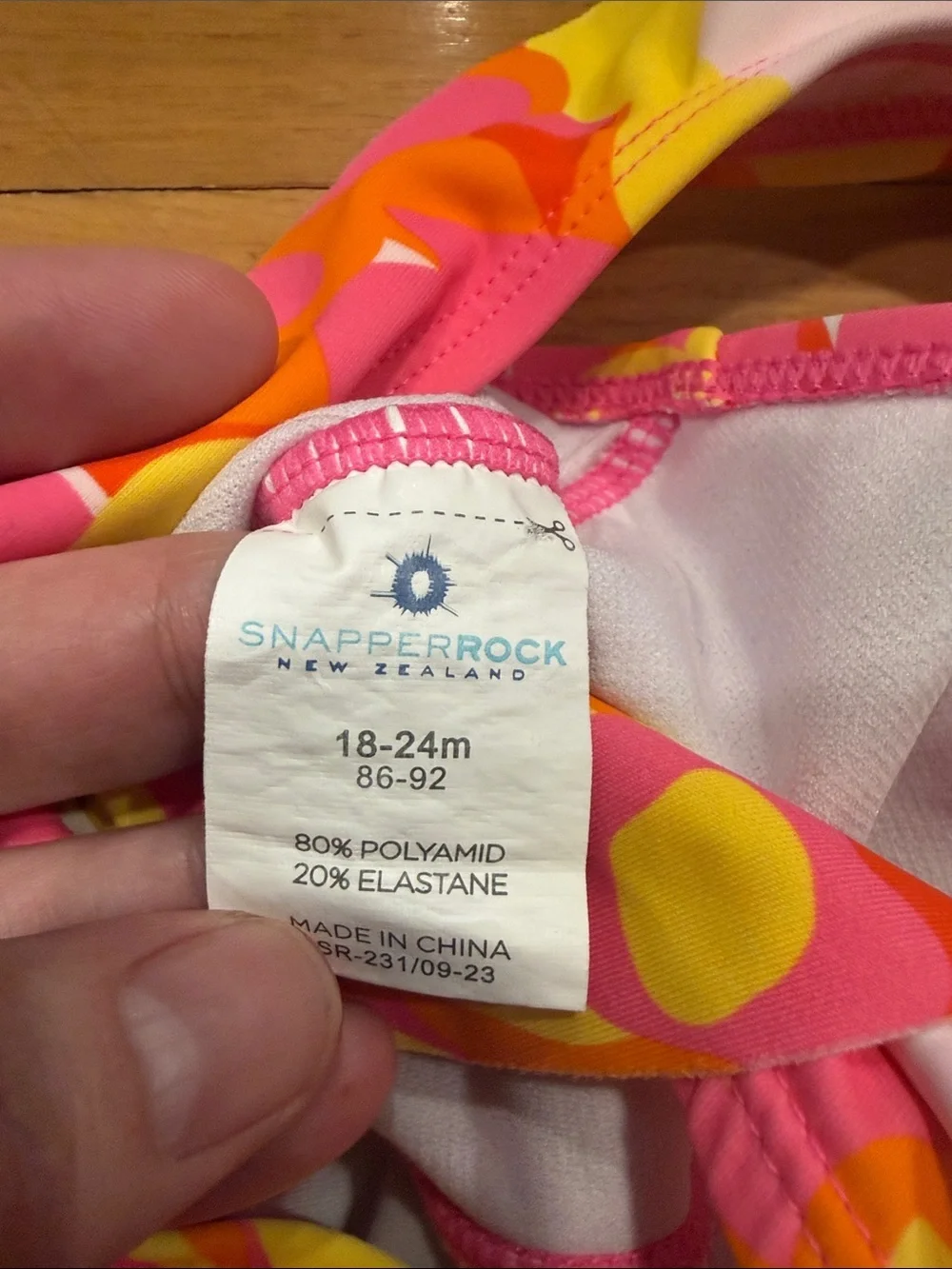 Snapper rock floral with ruffles one piece swimsuit size 18-24. Months .